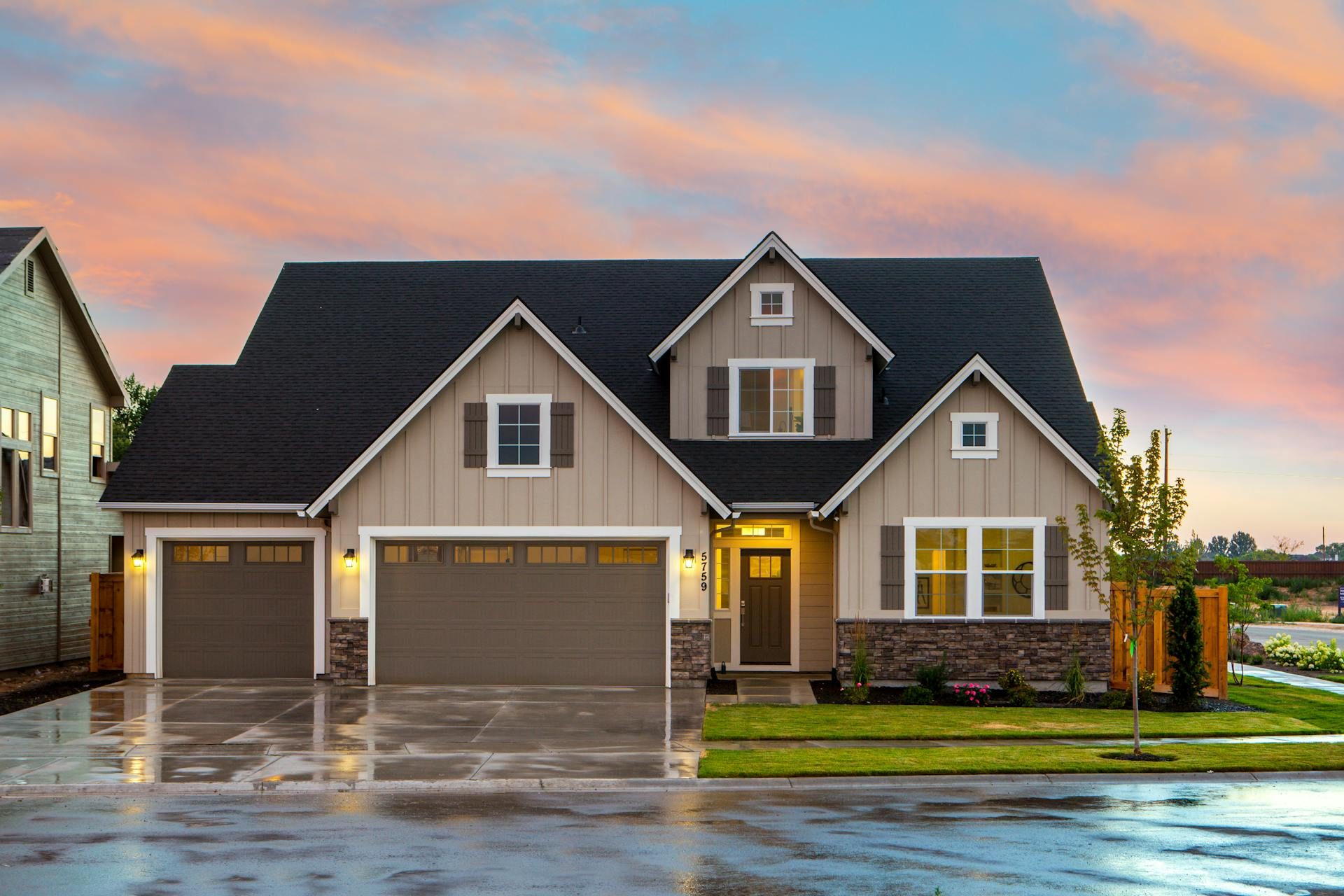 Beautiful New Hampshire home exterior with a new roof, siding and windows